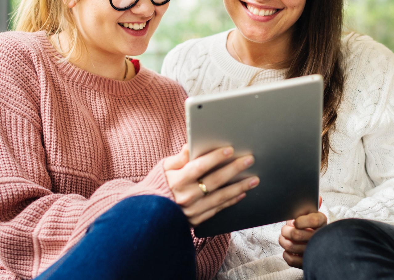 2 girls with ipad