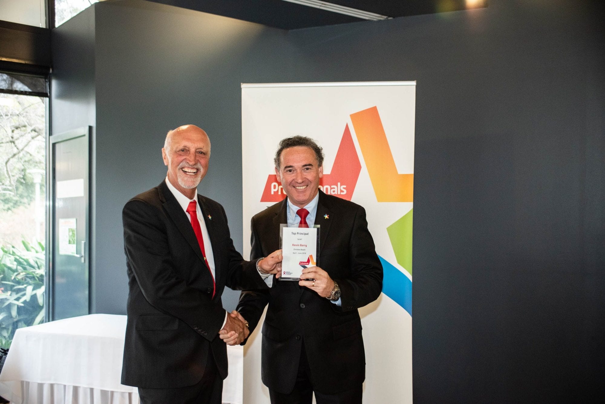 Kevin Barry receiving top real estate principal award